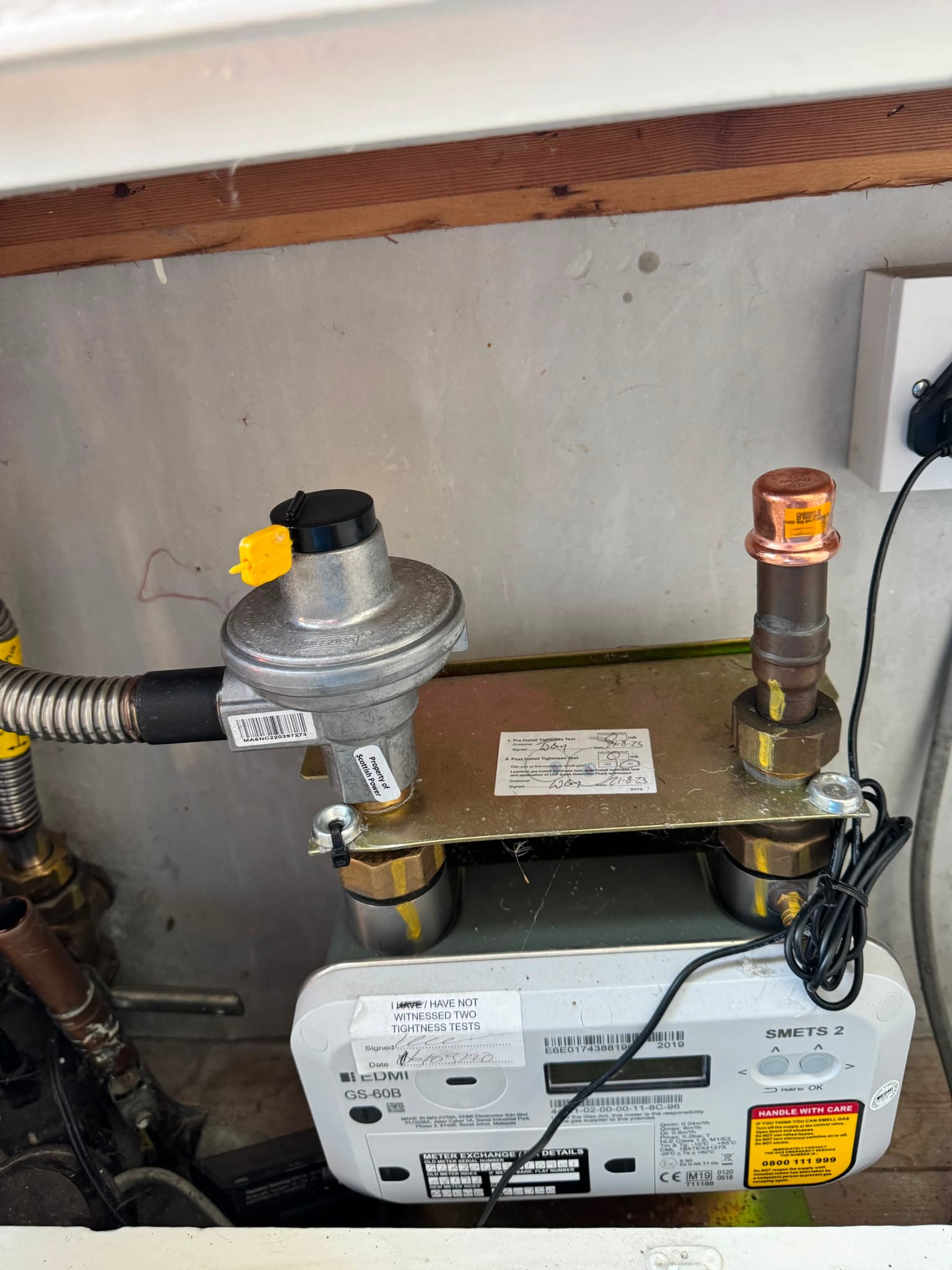 Gas meter work completed and tightness tested as part of the switch to heat pump heating