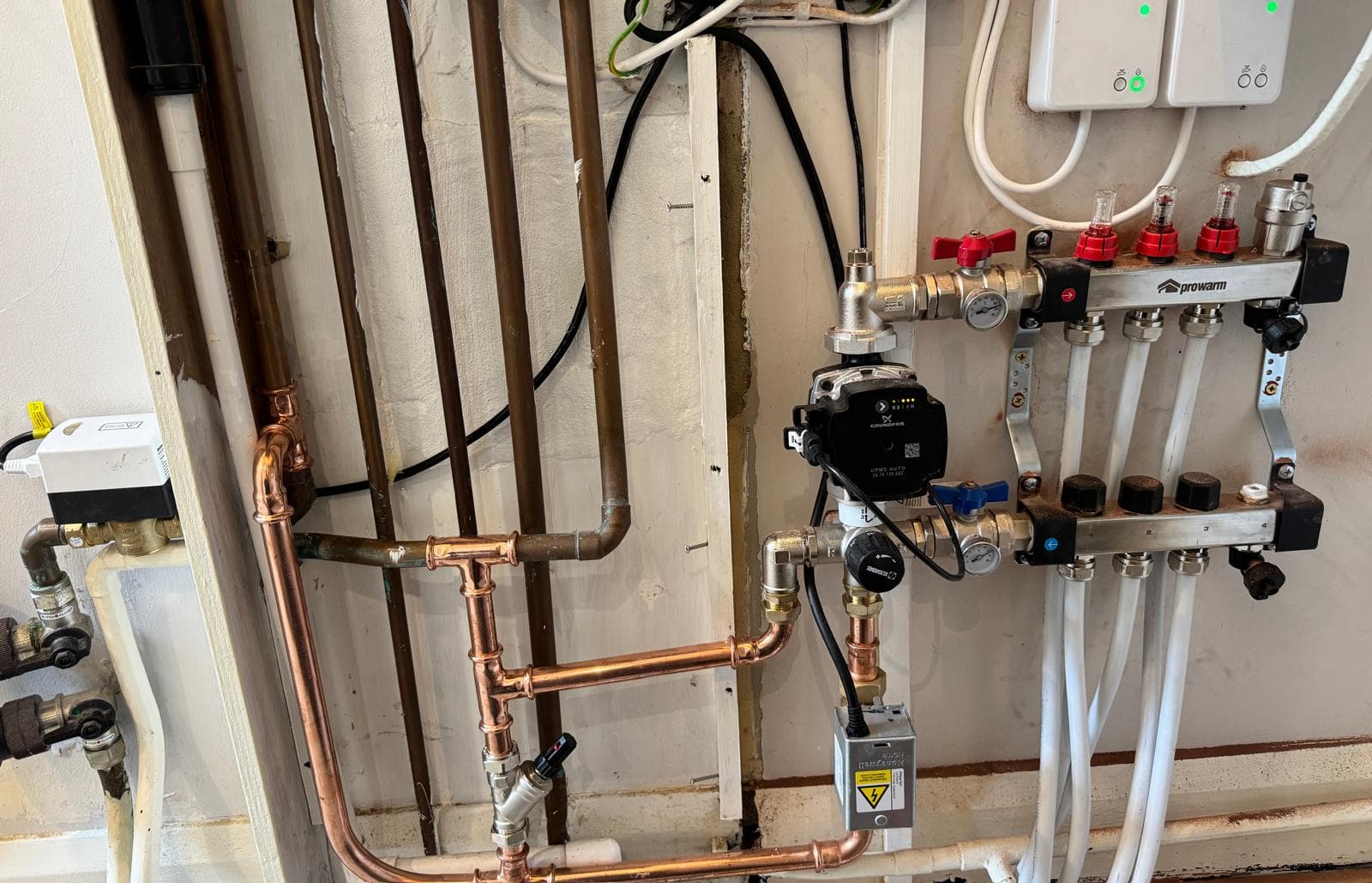New Prowarm underfloor heating manifold with pump and blending valve piped in copper